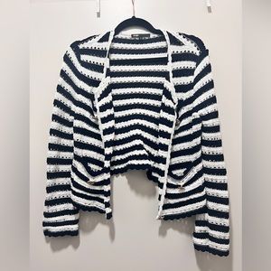 Never worn. Size 2 (US size 4-6 equivalent)